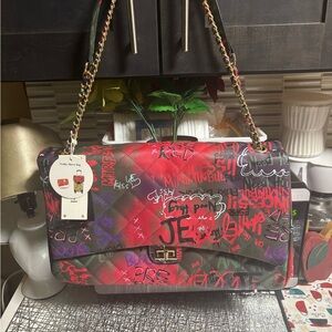 Vibrant Graffiti Quilted Trolley Sleeve Bag